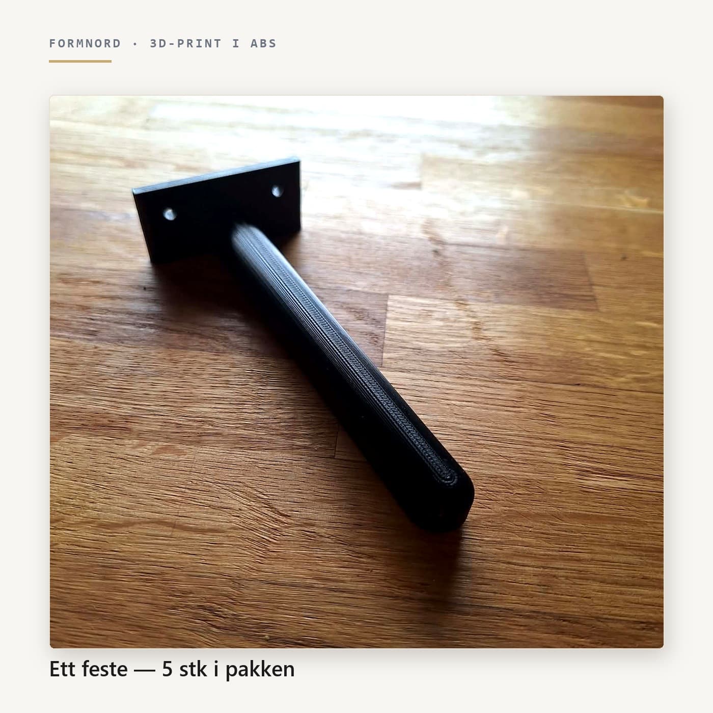 Enkelt teipfeste 3D-printet i sort ABS med veggplate og skruehull